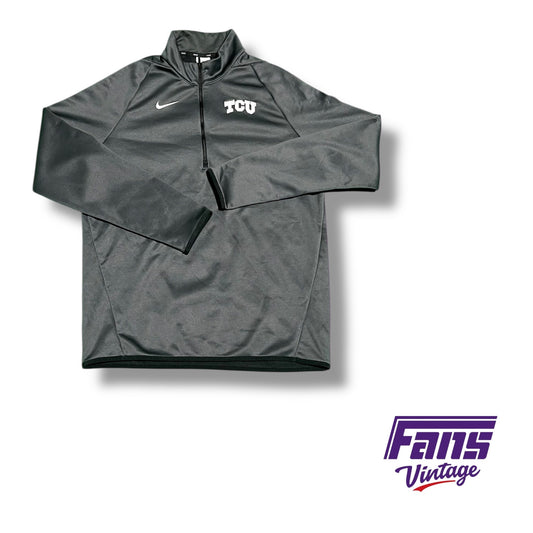 TCU team issued athracite grey 1/4-zip pullover with embroidered logo and fleece lining
